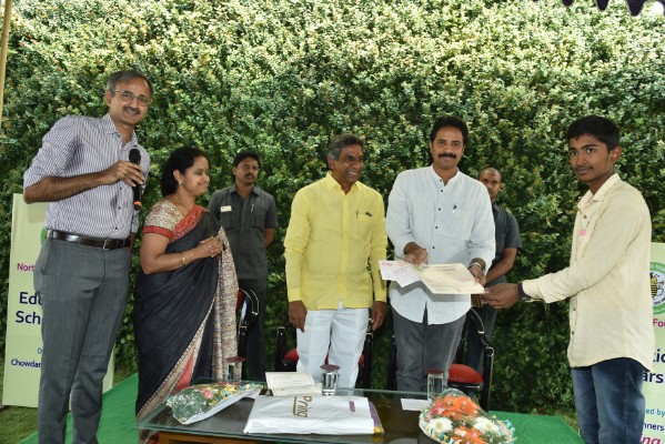 Distributed scholarship cheque hands on Chief Guests